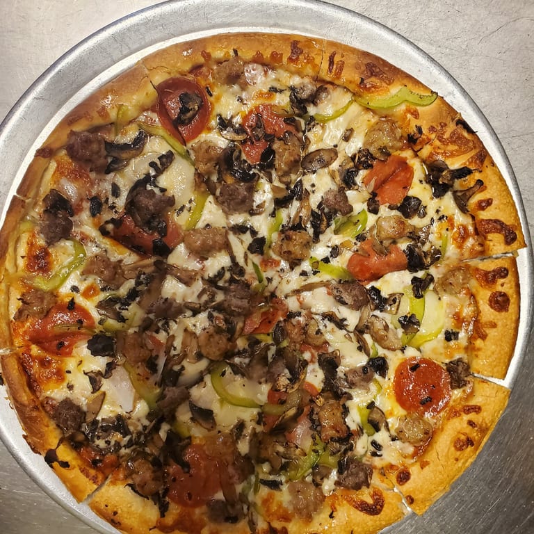 Indulge in Our Supreme Pizza